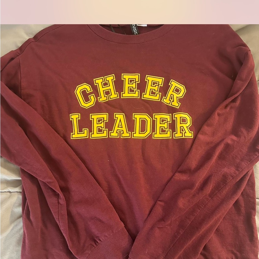 Divided Burgundy Sweatshirt with Yellow Print